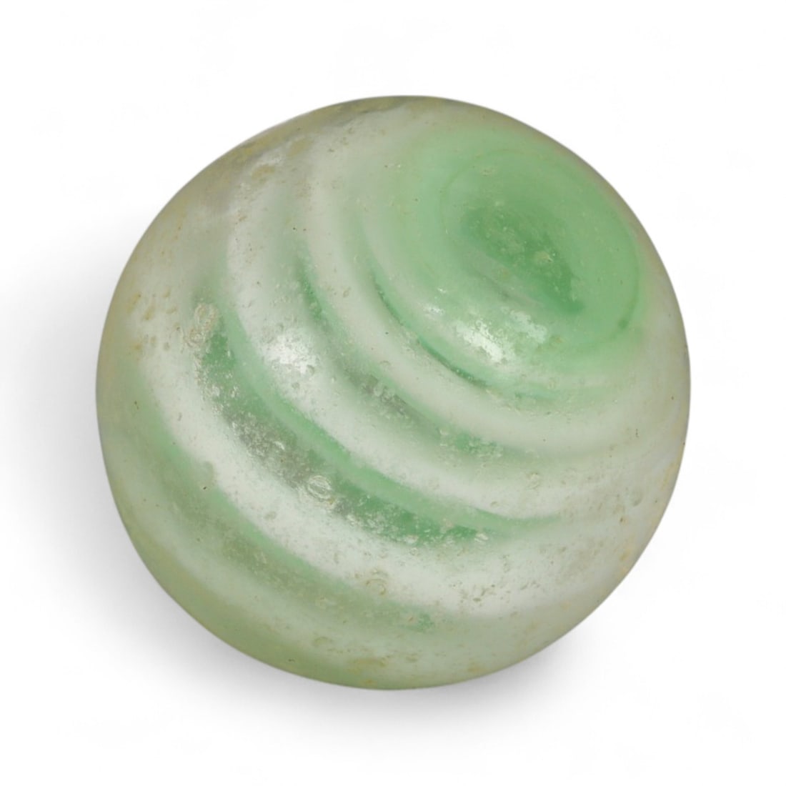 Vintage Swirled Pattern Glass Marble, c. Early-Mid 20th Century, 1.6cm: This charming vintage marble, is crafted from glass with a striking swirl design. Its spiraled pattern, creates a mesmerizing effect that reflects the playful artistry of traditional marble-making. Ea
