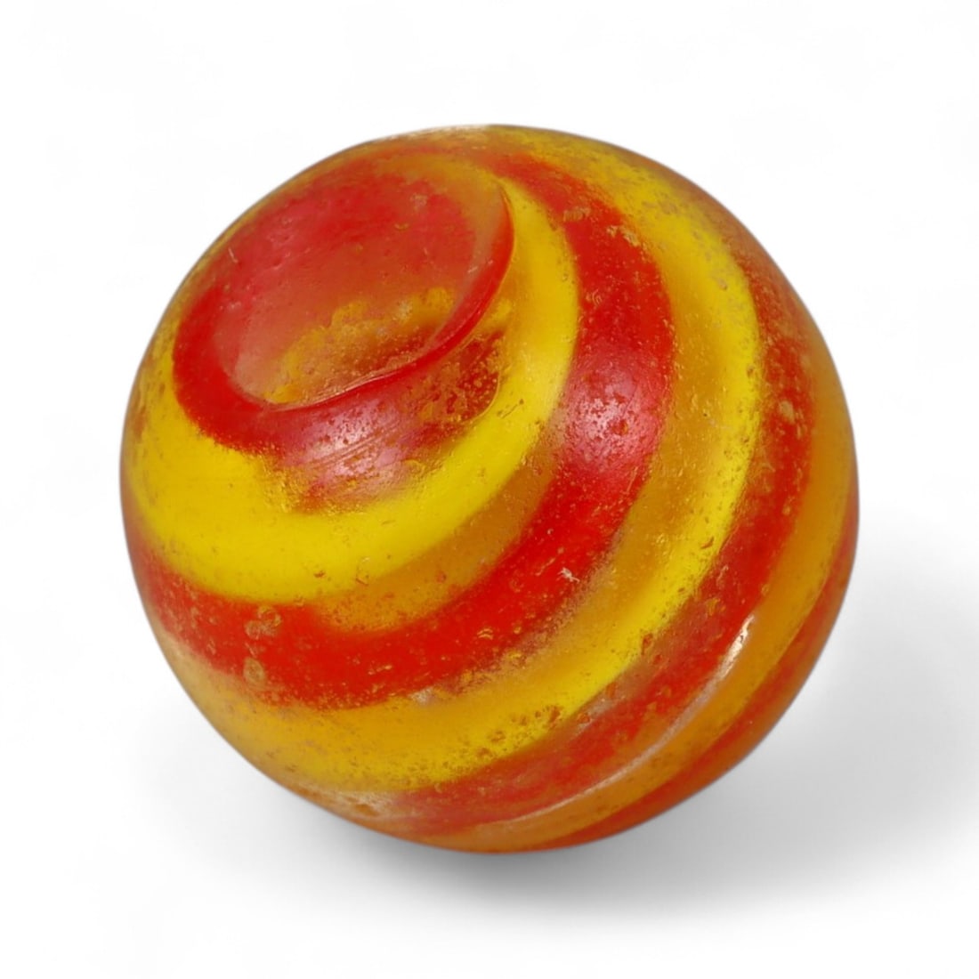 Vintage Swirled Pattern Glass Marble, c. Early-Mid 20th Century, 1.7cm: This charming vintage marble, is crafted from glass with a striking swirl design. Its spiraled pattern, creates a mesmerizing effect that reflects the playful artistry of traditional marble-making. Ea