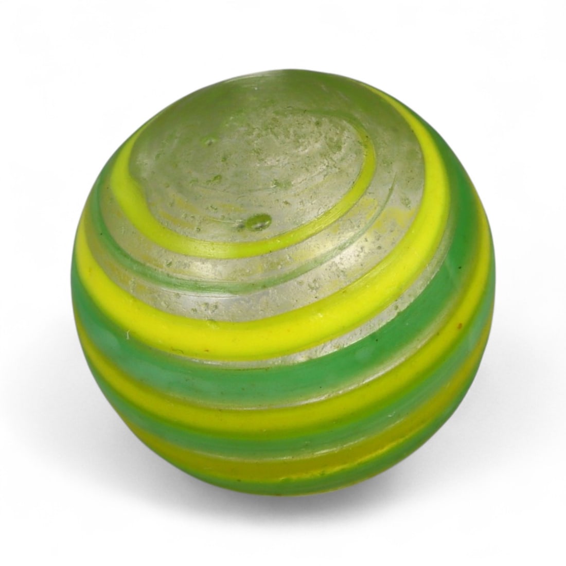 Vintage Swirled Pattern Glass Marble, c. Early-Mid 20th Century, 1.7cm: This charming vintage marble, is crafted from glass with a striking swirl design. Its spiraled pattern, creates a mesmerizing effect that reflects the playful artistry of traditional marble-making. Ea