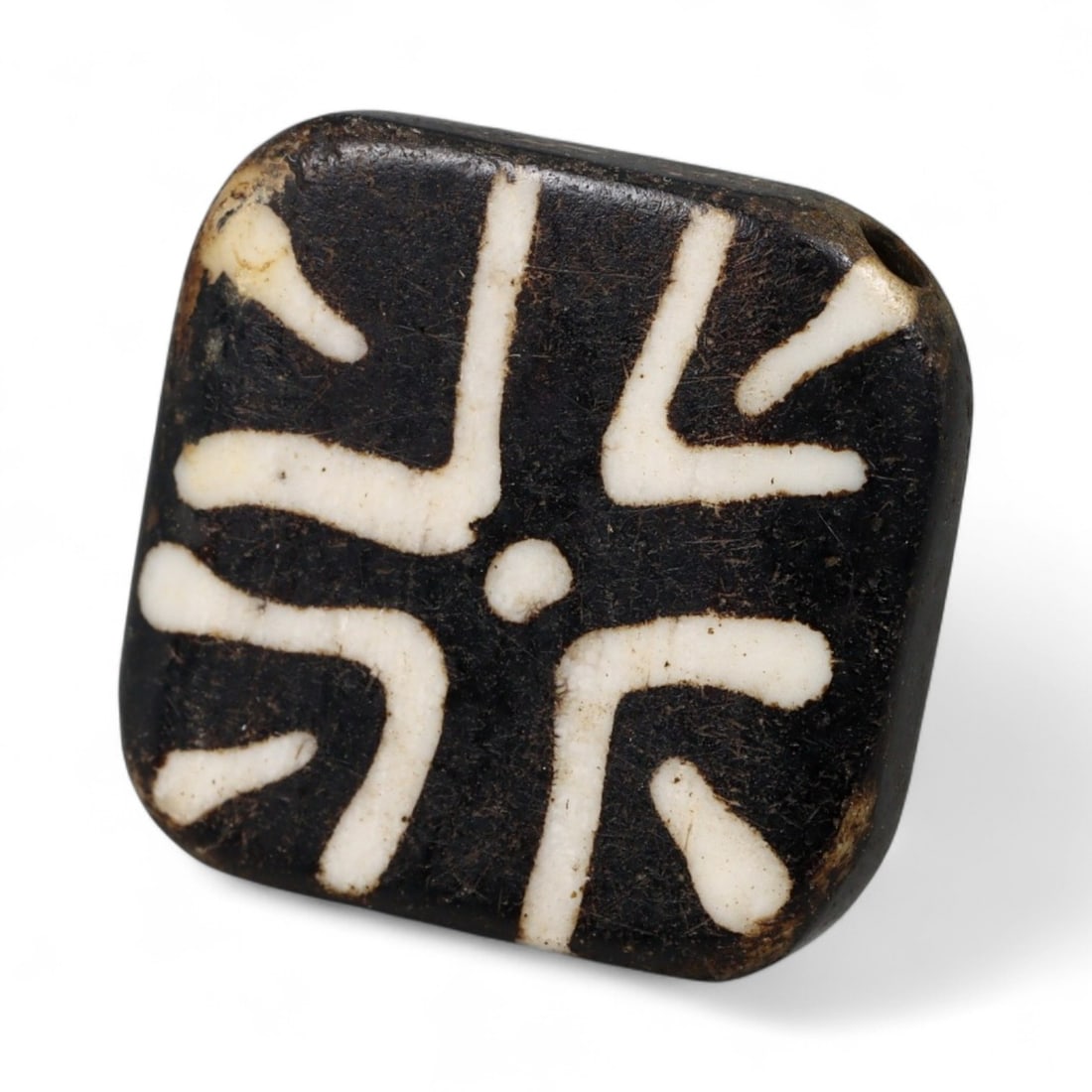 Antique Pyu Pumtek Etched Fossilized Bead, c. 18th-19th Century CE, 2cm: This antique Pumtek bead, originating from the Pyu cultural traditions of Burma (modern Myanmar), dates to the 18th-19th century CE. Carved from fossilized palm wood, its surface has been etched with 