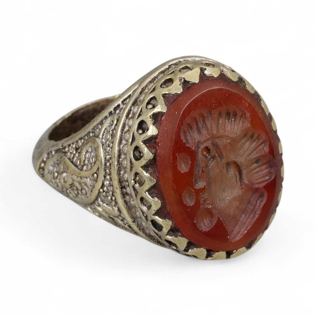 Antique Central Asian Red Carnelian Glass Intaglio Silver Ring, c. 19th-20th Century 10.5g: This antique silver ring is a striking example of Central Asian craftsmanship from the late Qajar and early 20th-century era. The bezel is set with a bold red carnelian-colored glass intaglio, engrave