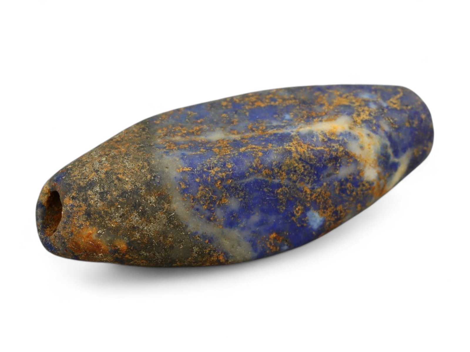 Ancient Mesopotamian Lapis Lazuli Bead, c. 2nd-1st Millennium BCE, 2.7cm: This ancient lapis lazuli bead, dating to the 2nd-1st millennium BCE, originates from the cradle of civilization in Mesopotamia, a region celebrated for its pioneering artistry and long-standing trade