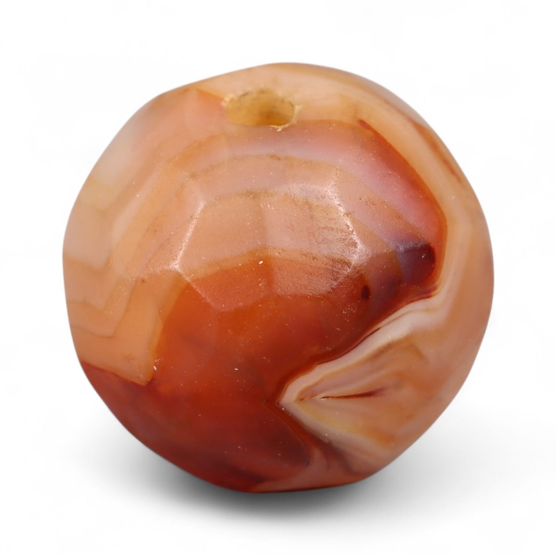 Antique Mughal Carnelian Faceted Bead, c. 16th-18th Century, 1.5cm: This antique faceted carnelian bead, dating to the Mughal period (c. 16th-18th century), reflects the refinement of Indian lapidary traditions under one of the most celebrated empires of the medieval 