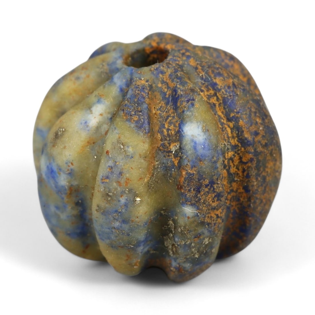 Ancient Mesopotamian Lapis Lazuli Bead, c. 2nd-1st Millennium BCE, 1.5cm: This ancient lapis lazuli bead, dating to the 2nd-1st millennium BCE, originates from the cradle of civilization in Mesopotamia, a region celebrated for its pioneering artistry and long-standing trade
