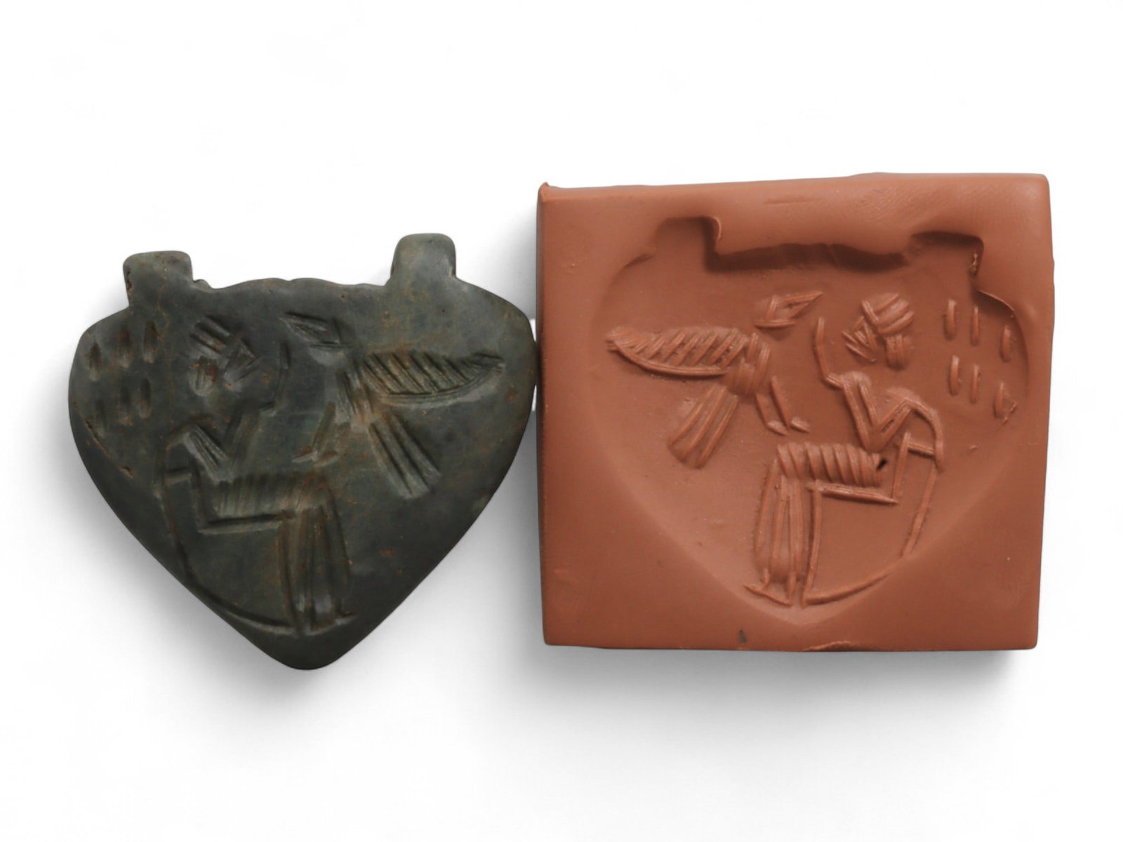 Ancient Near Eastern Relief Amulet Pendant Talisman, c. 2nd-5th Century CE, 4cm: This finely crafted ancient amulet pendant, designed for wear as a personal talisman. The engraved surface bears a carefully incised design, clearly visible when pressed into clay, illustrating its du