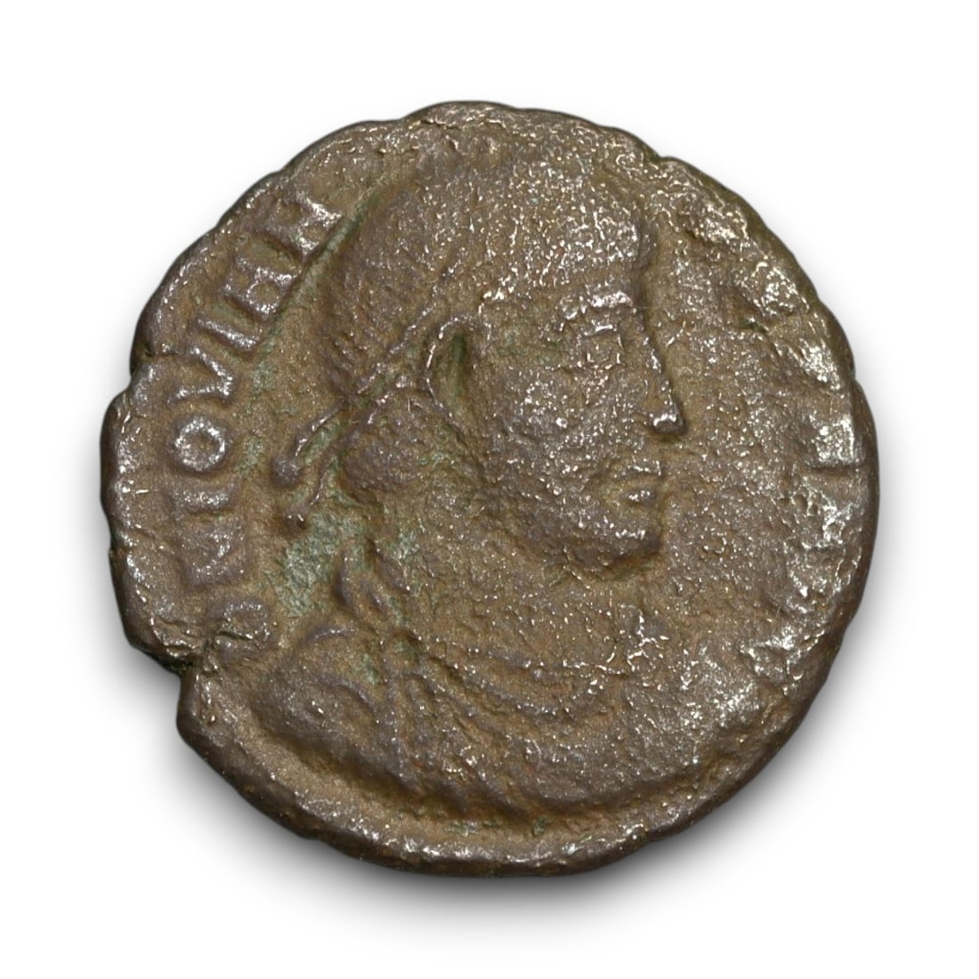 ROMAN EMPIRE: Imperial Authority - Bronze Coin, c. 1st-3rd Century AD, 18mm: Struck during the turbulent decades of the later Roman Empire, this bronze coin reflects the enduring symbolism of imperial control amidst crisis. Its compact yet deliberate design likely featured an