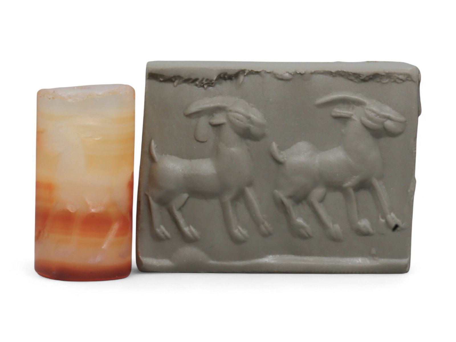 Ancient Mesopotamian Administrative Cylinder Seal, c. 2nd-1st Millennium BCE, 2.2cm: This authentic cylinder seal from ancient Mesopotamia dates to the 2nd to 1st millennium BCE, a time when the art of carving miniature narratives on stone reached remarkable levels of refinement. Seal