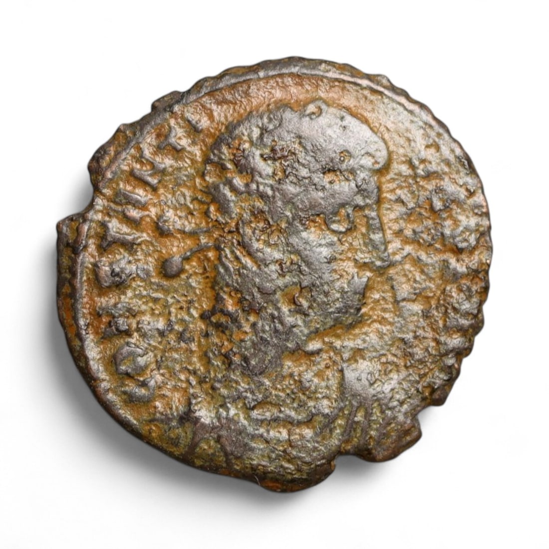 ROMAN EMPIRE: Imperial Authority - Bronze Coin, c. 1st-3rd Century AD, 15mm: Struck during the turbulent decades of the later Roman Empire, this 19mm bronze coin reflects the enduring symbolism of imperial control amidst crisis. Its compact yet deliberate design likely feature