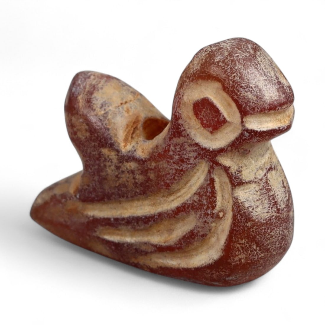 Ancient Coptic Egyptian Carnelian Bird Amulet, c. 5th-7th Century CE, 1.6cm: This delicate amulet, carved in the form of a bird and measuring 2 cm (0.78 inches), originates from Coptic Egypt, c. 5th-7th century CE. Birds held special symbolic resonance in Coptic Christian cult