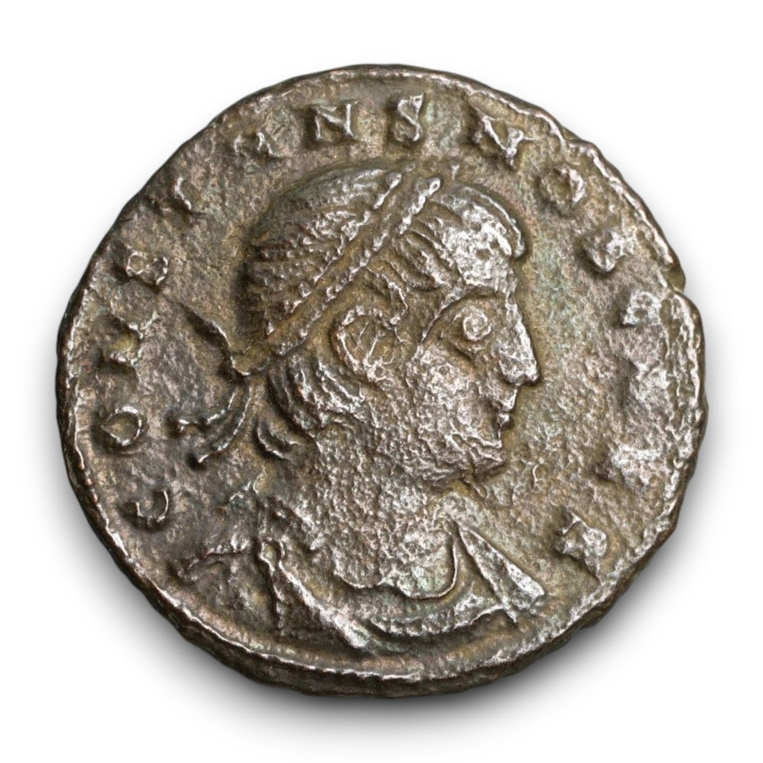 ROMAN EMPIRE: Imperial Authority - Bronze Coin, c. 1st-3rd Century AD, 19mm: Struck during the turbulent decades of the later Roman Empire, this 19mm bronze coin reflects the enduring symbolism of imperial control amidst crisis. Its compact yet deliberate design likely feature