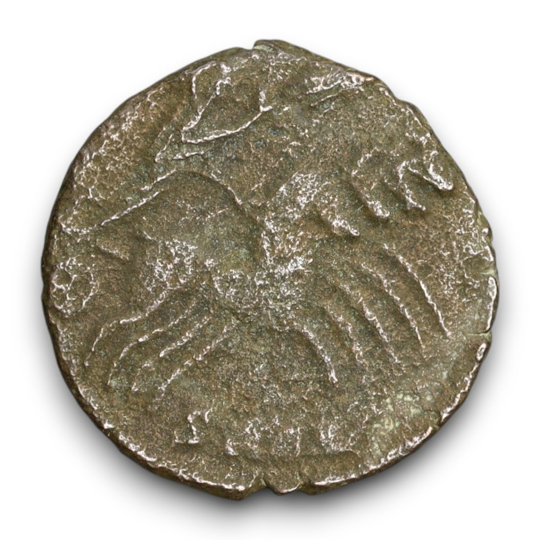 ROMAN EMPIRE: Imperial Authority - Bronze Coin, c. 1st-3rd Century AD, 15mm: Struck during the turbulent decades of the later Roman Empire, this 19mm bronze coin reflects the enduring symbolism of imperial control amidst crisis. Its compact yet deliberate design likely feature