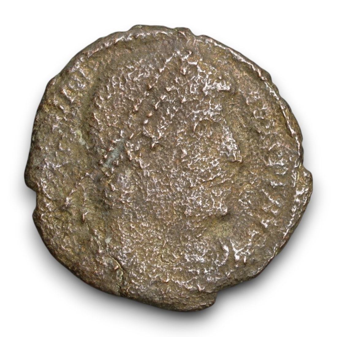 ROMAN EMPIRE: Imperial Authority - Bronze Coin, c. 1st-3rd Century AD, 18mm: Struck during the turbulent decades of the later Roman Empire, this 19mm bronze coin reflects the enduring symbolism of imperial control amidst crisis. Its compact yet deliberate design likely feature