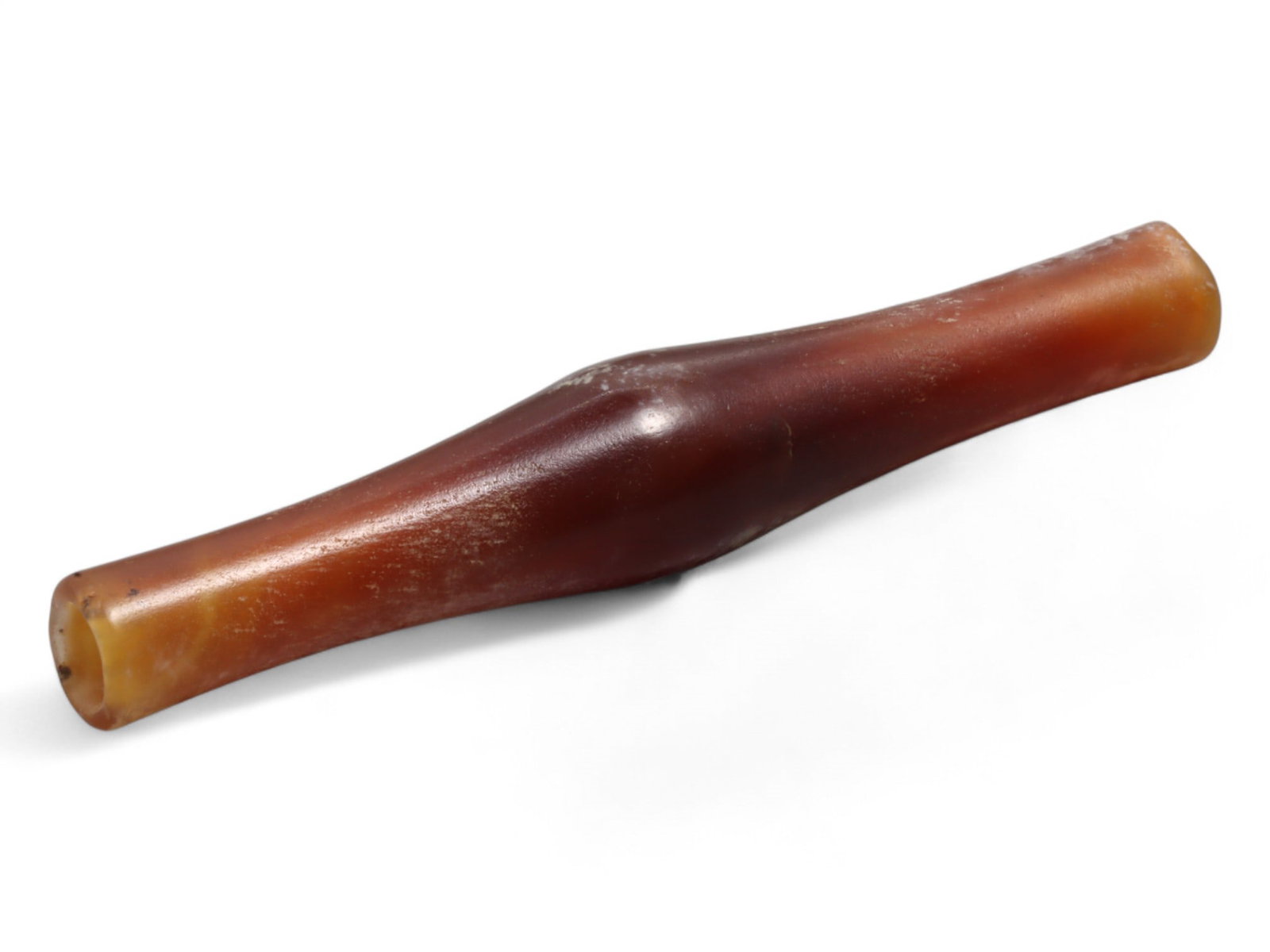Ancient Near Eastern Carnelian Biconical Bead, c. 21st-18th Century BC, 6.4cm, 7g: This elegant carnelian bead, originates from the Early Bronze to Middle Bronze Age, dating to the 21st-18th century BC. Likely produced in the region of Tepe Marlik or Amlash in northwestern Iran, it 