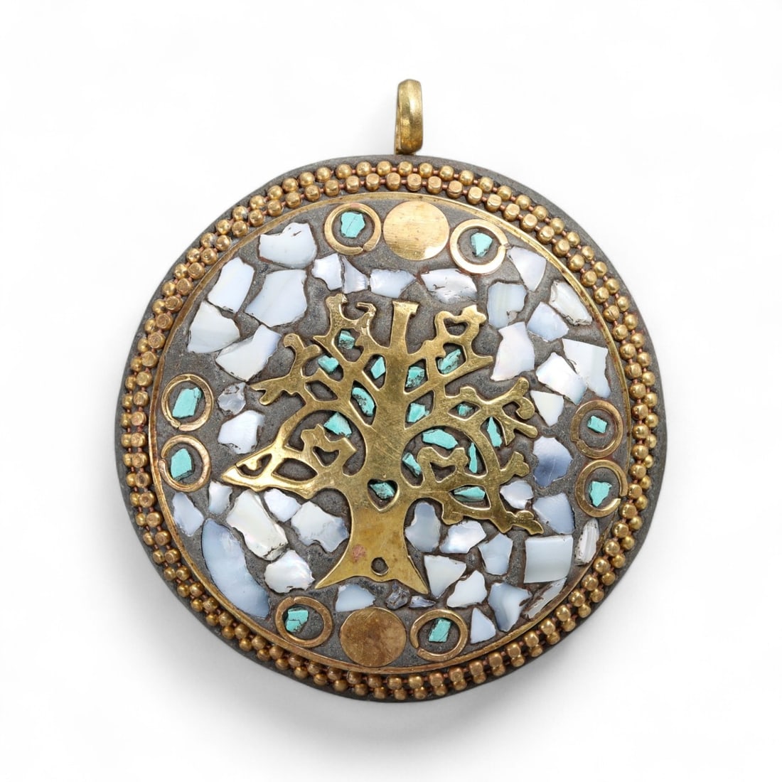 Vintage Himalayan Brass and Inlay Tree of Life Pendant, 20th Century, 5.6 cm: This striking pendant showcases the Tree of Life motif, a powerful and universal symbol of growth, connection, and spiritual grounding. Crafted in brass, the central tree design spreads its branches a