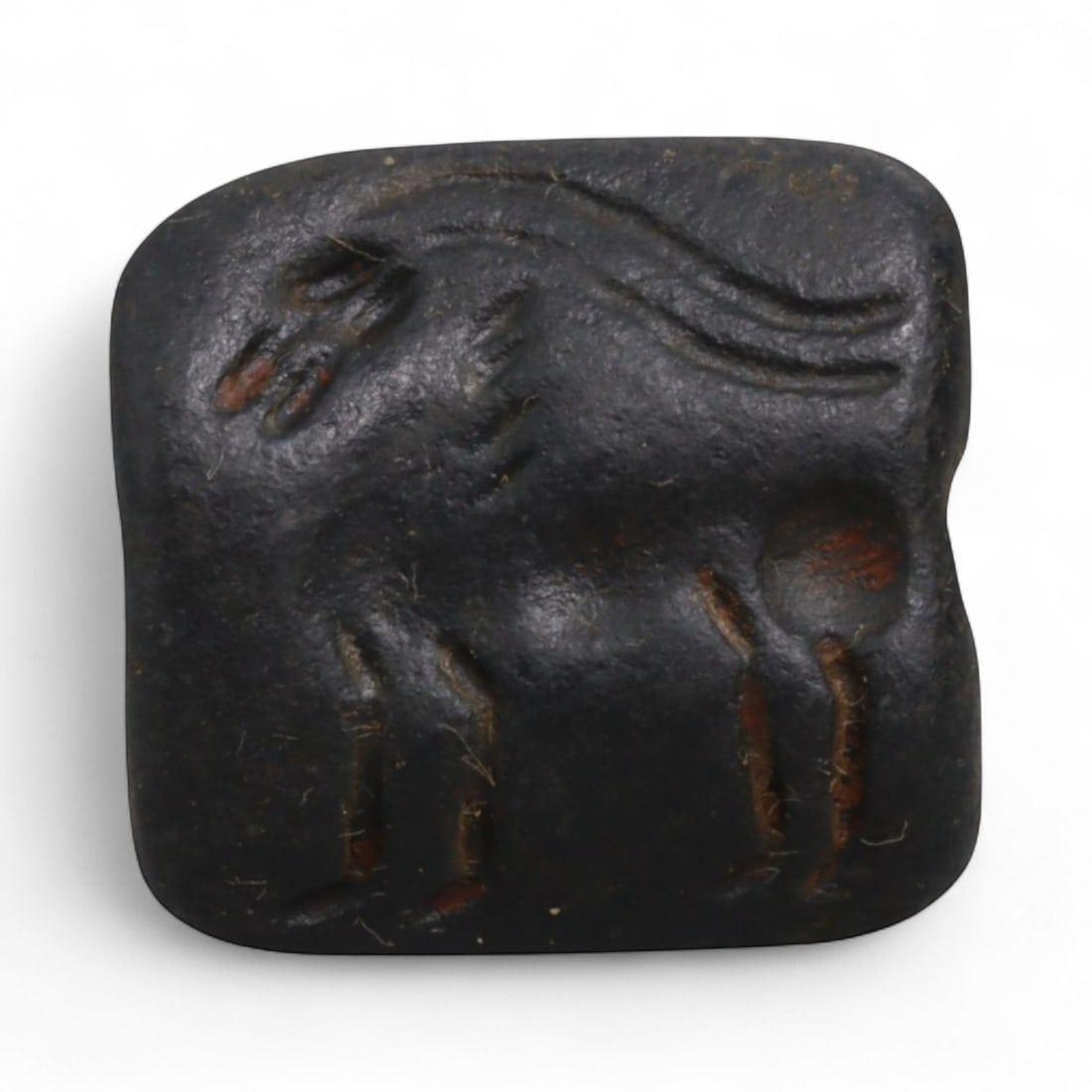 Ancient Indus Valley Carved Steatite Double-Convex Bead with Equine Motifs, c. 2500-2000 BCE 7g: This carved steatite double-convex bead dates to the mature phase of the Indus Valley Civilization (c. 2500-2000 BCE), a flourishing urban culture celebrated for its mastery of bead-making and symboli