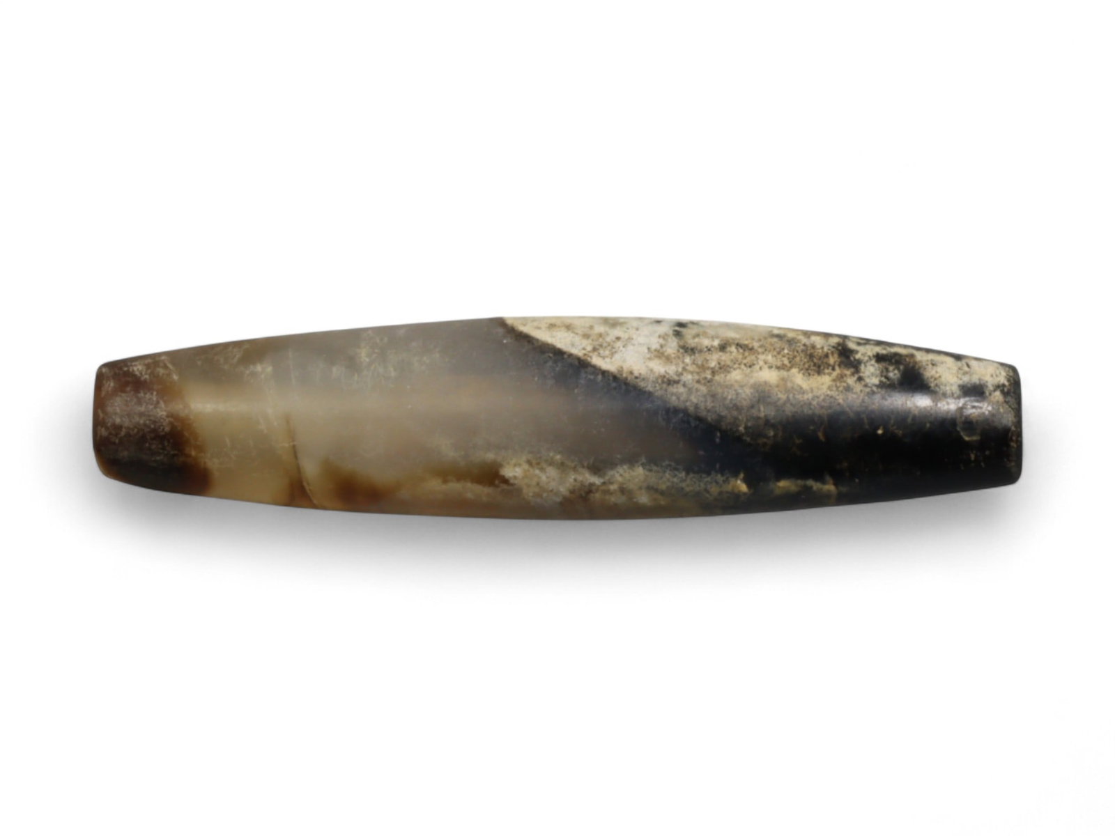 Ancient Achaemenid Parthian Long Barrel Agate Bead, c. 5th Century BCE-2nd Century CE, 4.3cm, 6g: This elegant bead, carved from agate, its form is a long barrel (elongated cylindrical) shape, tapering slightly at both ends, a style widely favored in the Achaemenid through Parthian periods (c. 550