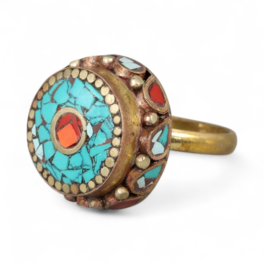 Vintage Himalayan Turquoise Coral Mosaic Brass Ring, 20th Century, US 9.5: This vintage Himalayan ring displays a bold circular bezel inlaid with a mosaic of turquoise and coral, framed by gilt brass accents. The central coral stone stands out against the sky-blue turquoise 