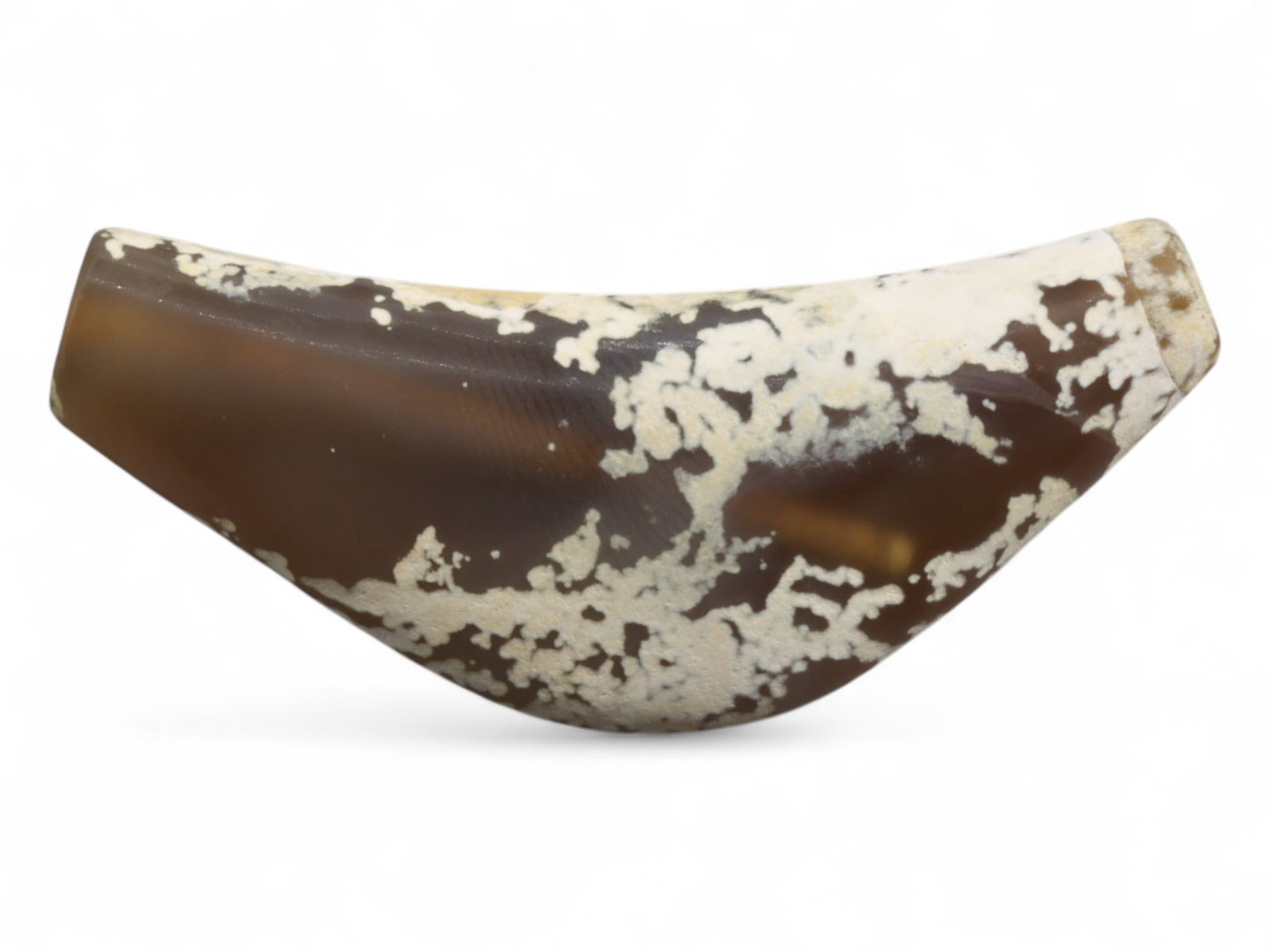 Ancient Parthian-Roman Carnelian Bow Amulet Bead, c. 1st-3rd Century CE, 5cm, 13g: This finely carved bow-shaped bead, is fashioned from carnelian agate with natural inclusions that lend it a mottled red-and-white surface of striking beauty. Originating from the Parthian-Roman perio