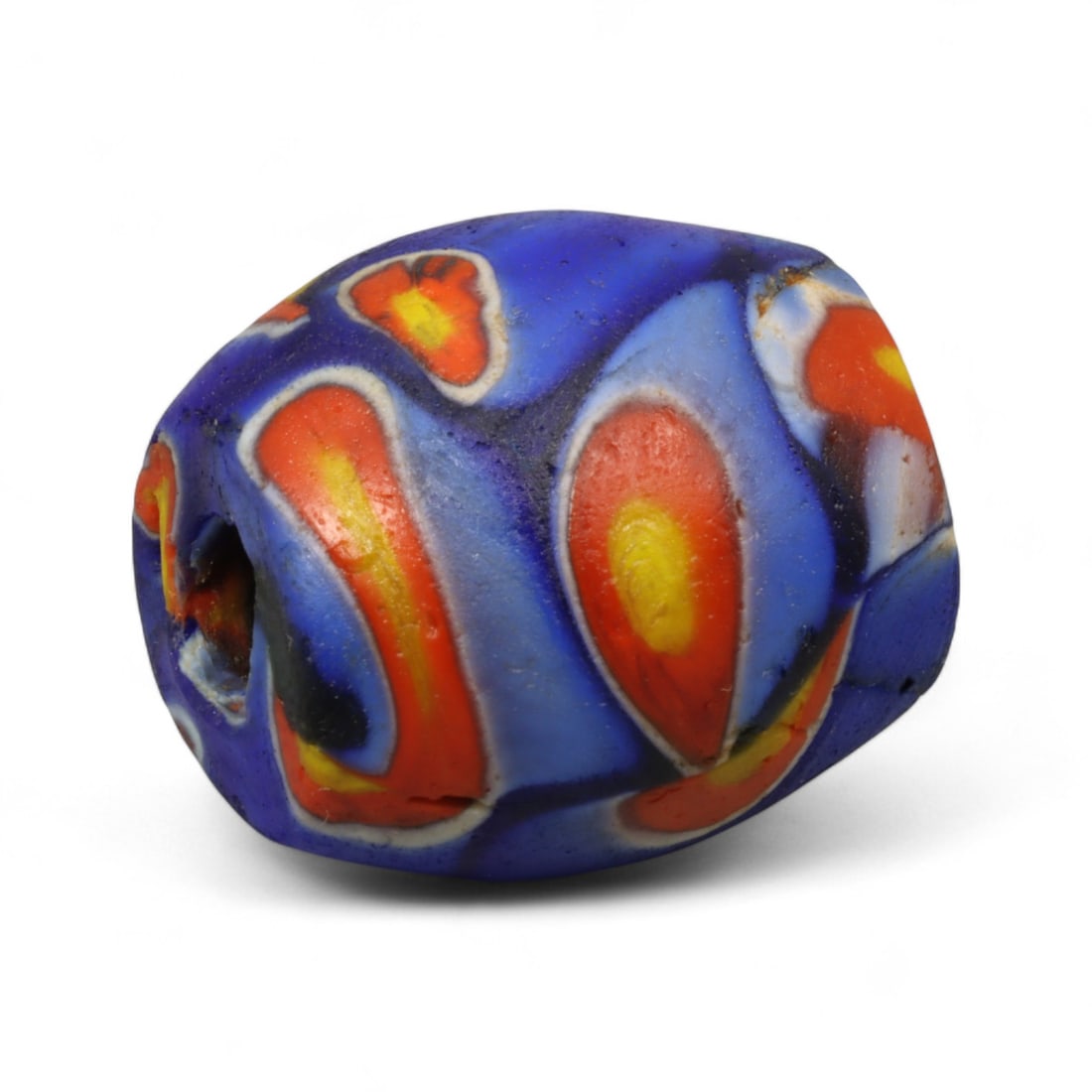 Antique Venetian Millefiori Mosaic Glass Bead, c. 19th Century, 2.2cm: This bold Venetian millefiori bead, crafted in the 19th century, exemplifies the dazzling artistry of Murano glassmakers. Set against a cobalt-blue body, its surface is decorated with vibrant mosaic c