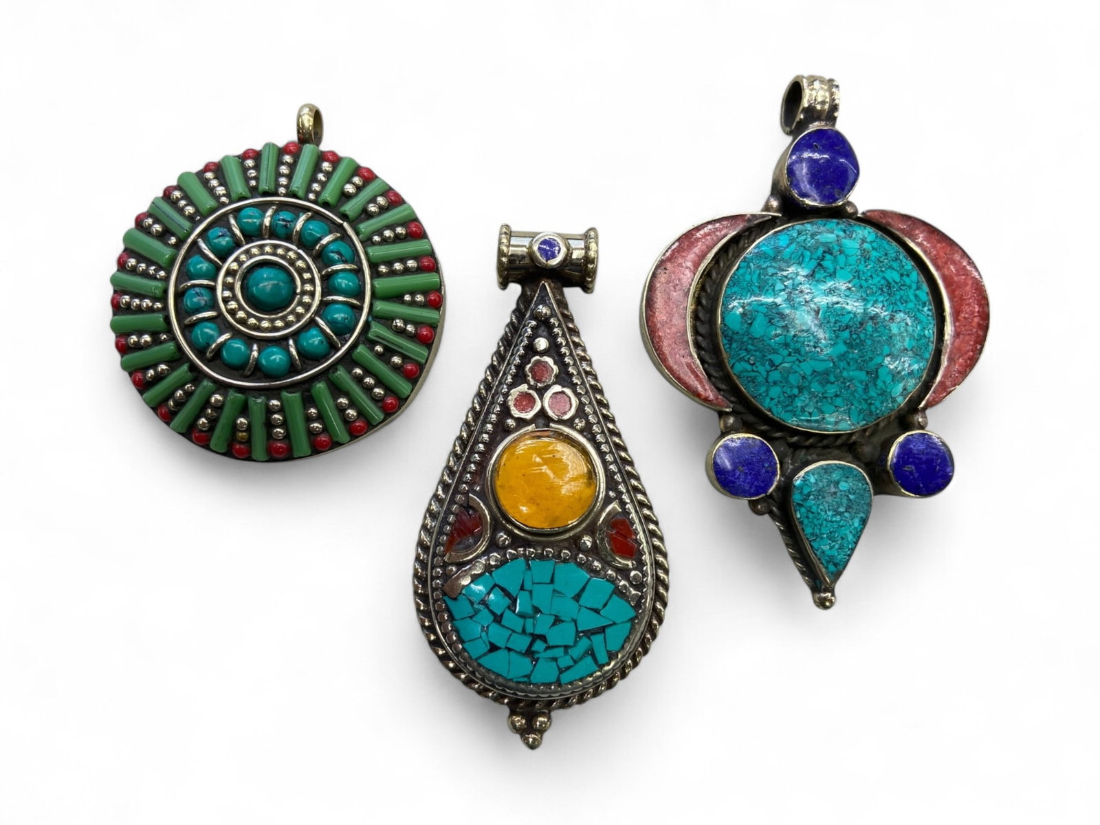 Vintage Himalayan Tibetan Tribal Pendants, Set of Three, c. 20th Century, 127g: Himalayan Tibetan pendants of this type embody the bold artistry and cultural symbolism of tribal jewelry traditions from the highlands of Tibet and Nepal. Distinguished by their substantial forms, vi
