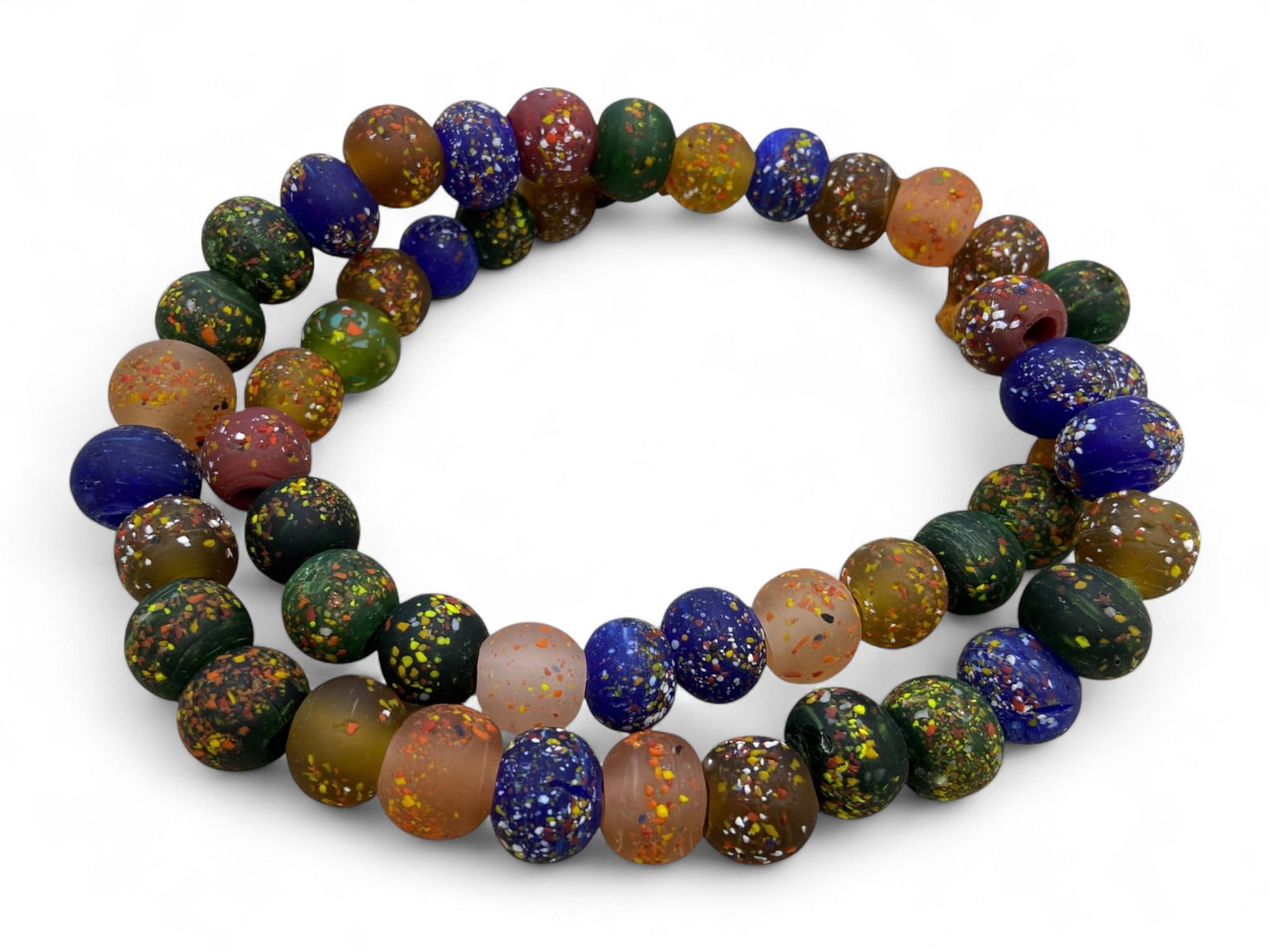 Antique Venetian Mosaic Glass Bead Strand, c. 19th Century 168g: This antique glass bead strand, dating to the 19th century, exemplifies the brilliance of Venetian glassmakers who transformed simple adornments into vibrant works of art. Each bead is richly decorate