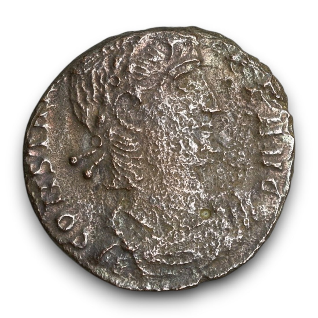 ROMAN EMPIRE: Imperial Authority - Bronze Coin, c. 1st-3rd Century AD, 15mm: Struck during the turbulent decades of the later Roman Empire, this 19mm bronze coin reflects the enduring symbolism of imperial control amidst crisis. Its compact yet deliberate design likely feature