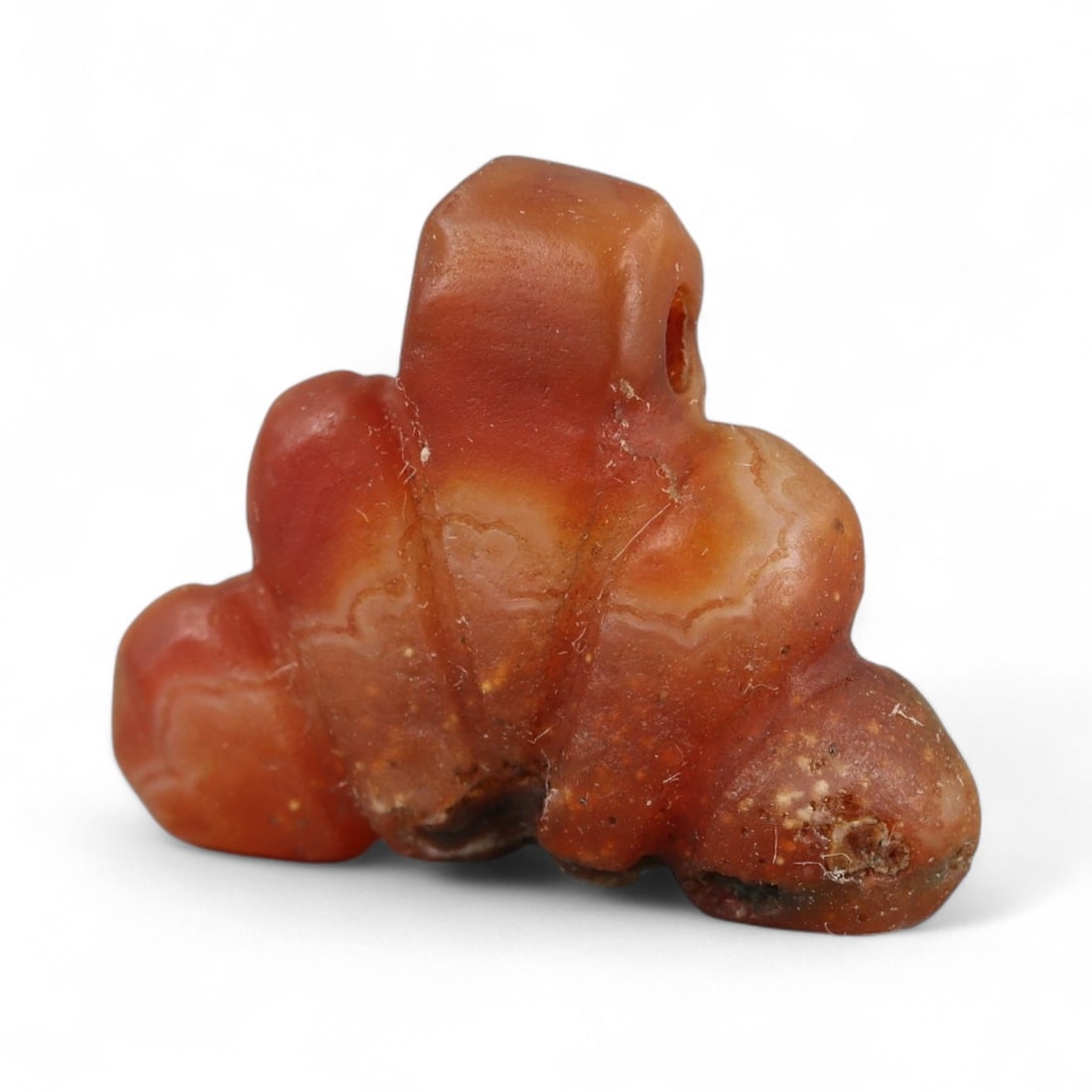 Ancient Coptic Egyptian Carnelian Amulet, c. 4th-7th Century CE, 1.8cm: This finely carved carnelian amulet originates from the Coptic Egyptian period, c. 4th-7th century CE, a time when Christianity flourished in Egypt and blended with deeply rooted Pharaonic traditions.
