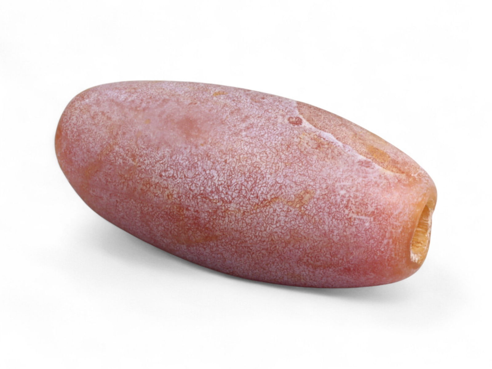 Ancient Medieval Tibetan Carnelian Barrel Bead, c. 12th-15th Century CE, 2.5cm: This elongated barrel bead, carved from vivid orange-red carnelian, originates from the Himalayan and Central Asian cultural sphere during the medieval Tibetan period, c. 12th-15th century CE. It show