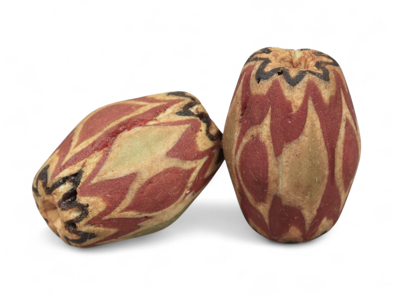 Antique Venetian Chevron Trade Glass Beads, c. 18th-19th Century, 2cm: These striking antique glass beads originate from Venice, renowned during the 18th and 19th centuries for its unparalleled glassmaking traditions centered in Murano. Known as chevron beads, they were 