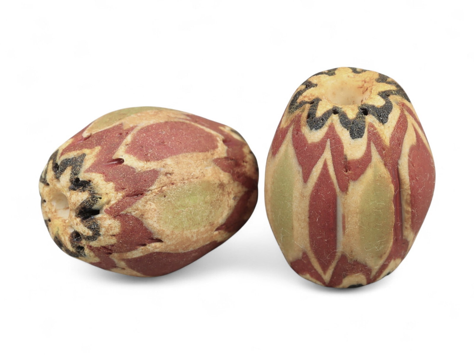Antique Venetian Chevron Trade Glass Beads, c. 18th-19th Century, 2.2-2.4cm: These striking antique glass beads originate from Venice, renowned during the 18th and 19th centuries for its unparalleled glassmaking traditions centered in Murano. Known as chevron beads, they were 