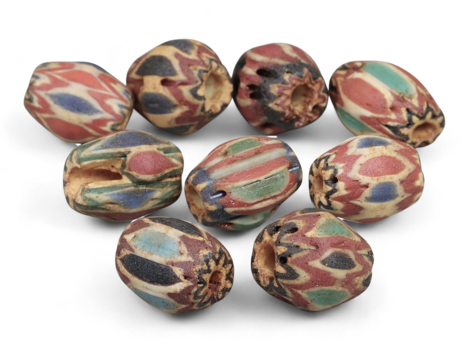 Antique Venetian Chevron Trade Glass Beads, c. 18th-19th Century, 1.2-1.3cm: This fine lot of Venetian chevron beads represents the height of Murano glass artistry during the 18th and 19th centuries. Known for their layered starburst patterns, chevron beads were among the most