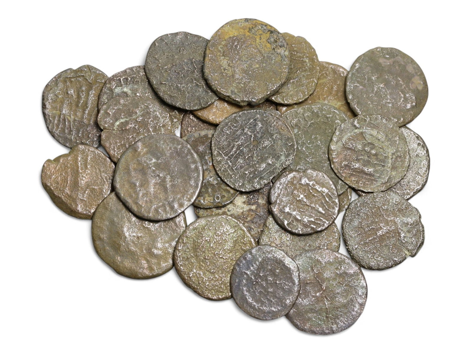 Ancient Roman Bronze Coins Lot, AE3 and AE4, c. 3rd-5th Century CE, 25 Coins: This lot of 25 bronze coins represents the currency of the late Roman Empire, spanning the 3rd to 5th centuries CE. These pieces, known as AE3 and AE4 denominations, were the small change of the Roman