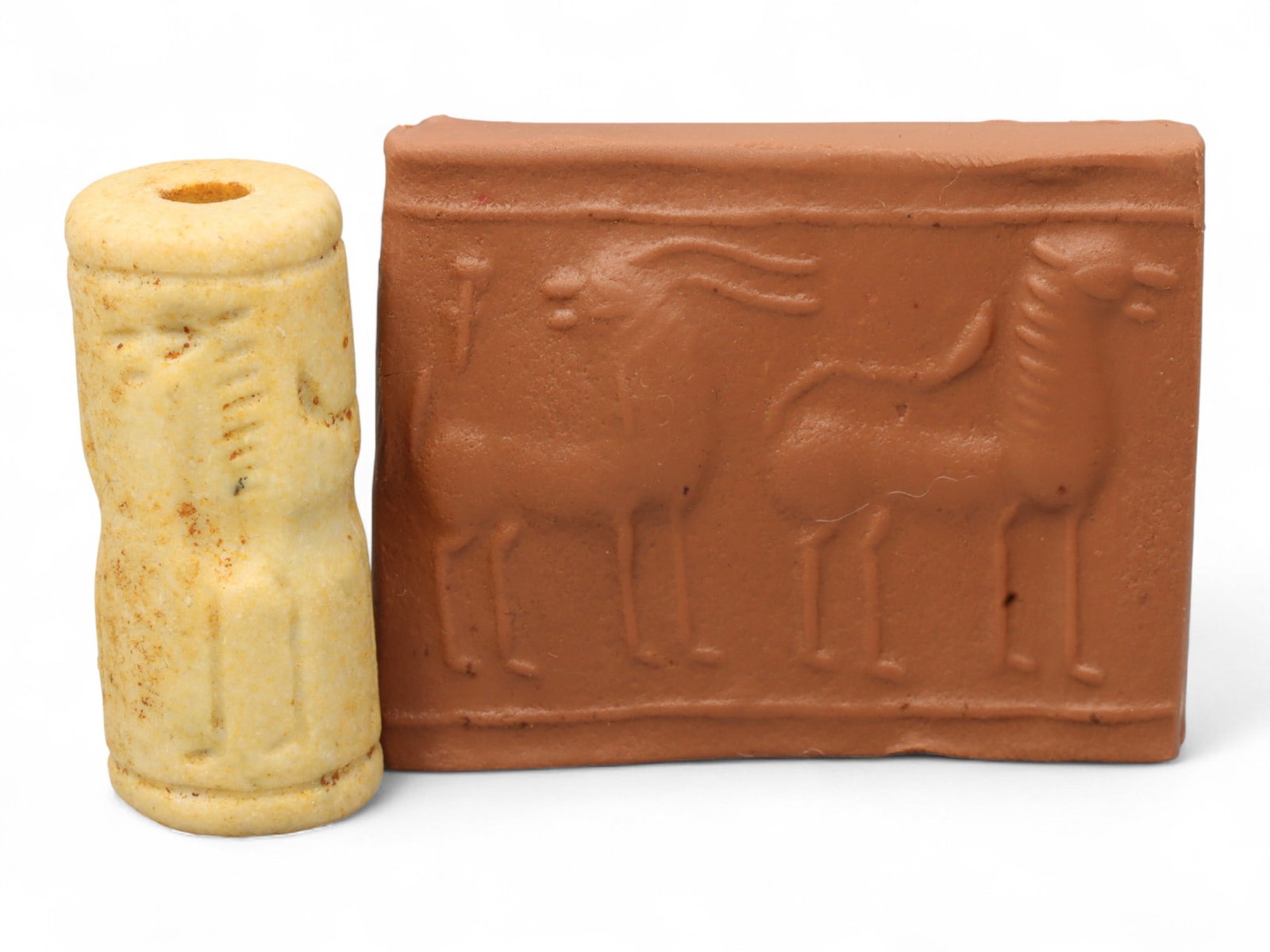 Ancient Mesopotamian Administrative Cylinder Seal, c. 2nd-1st Millennium BCE, 3.3cm: This authentic cylinder seal from ancient Mesopotamia dates to the 2nd to 1st millennium BCE, a time when the art of carving miniature narratives on stone reached remarkable levels of refinement. Seal