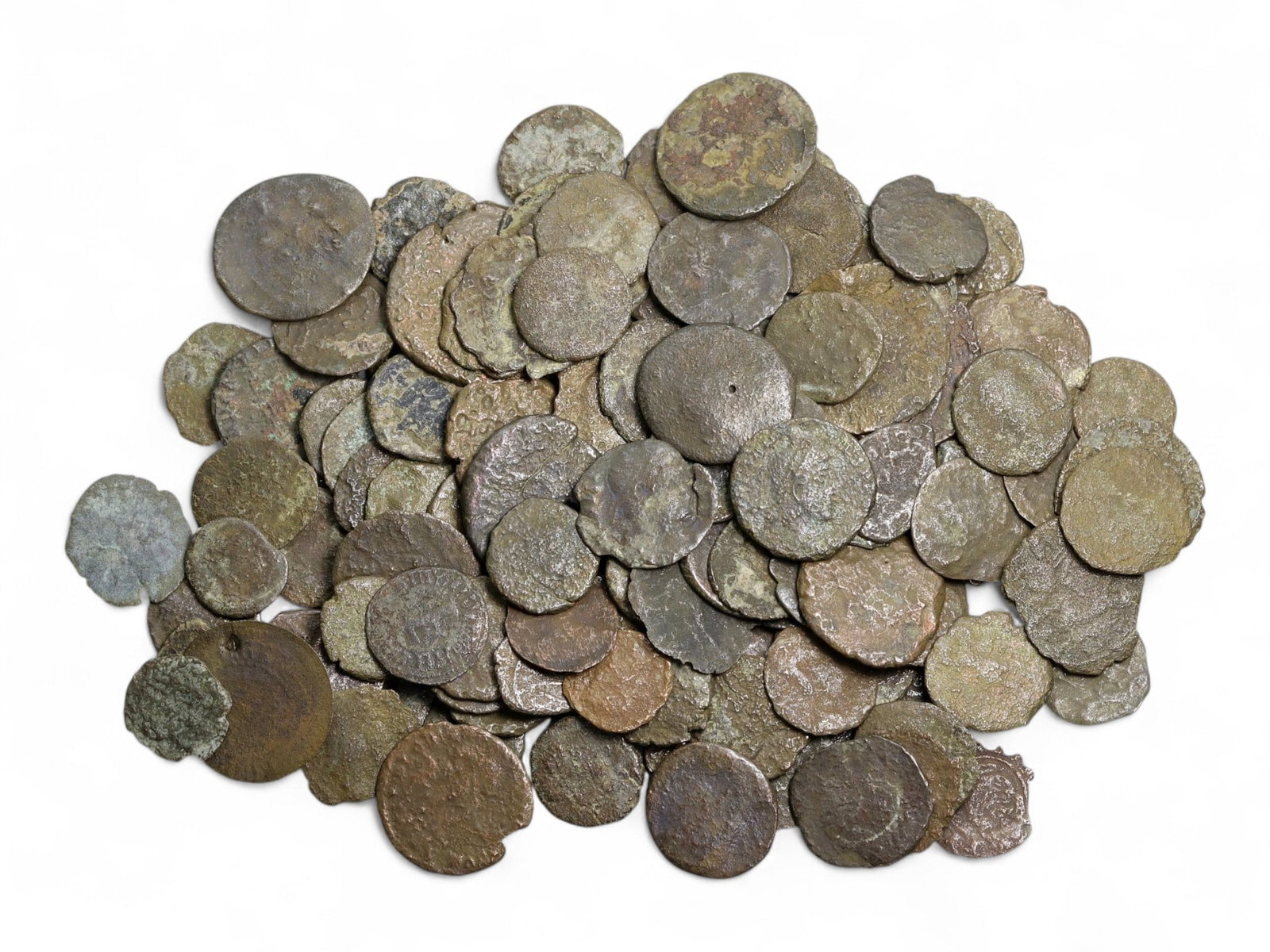 Ancient Roman Bronze Coins Lot, AE3 and AE4, c. 3rd-5th Century CE, 133 Coins: This remarkable lot of 133 bronze coins offers a sweeping view into the late Roman Empire, spanning the 3rd to 5th centuries CE. These AE3 and AE4 denominations represented the daily currency of Rome,