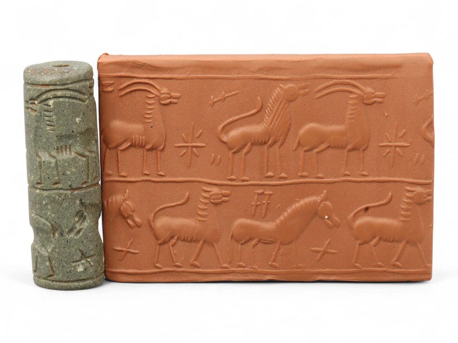 Ancient Akkadian Caprid and Equid Procession Stone Cylinder Seal, c. 2300-2100 BCE, 5.5cm: This finely engraved stone cylinder seal dates to the Akkadian Empire, c. 2300-2100 BCE - one of the earliest and most influential civilizations of Mesopotamia. The Akkadians refined the tradition of 
