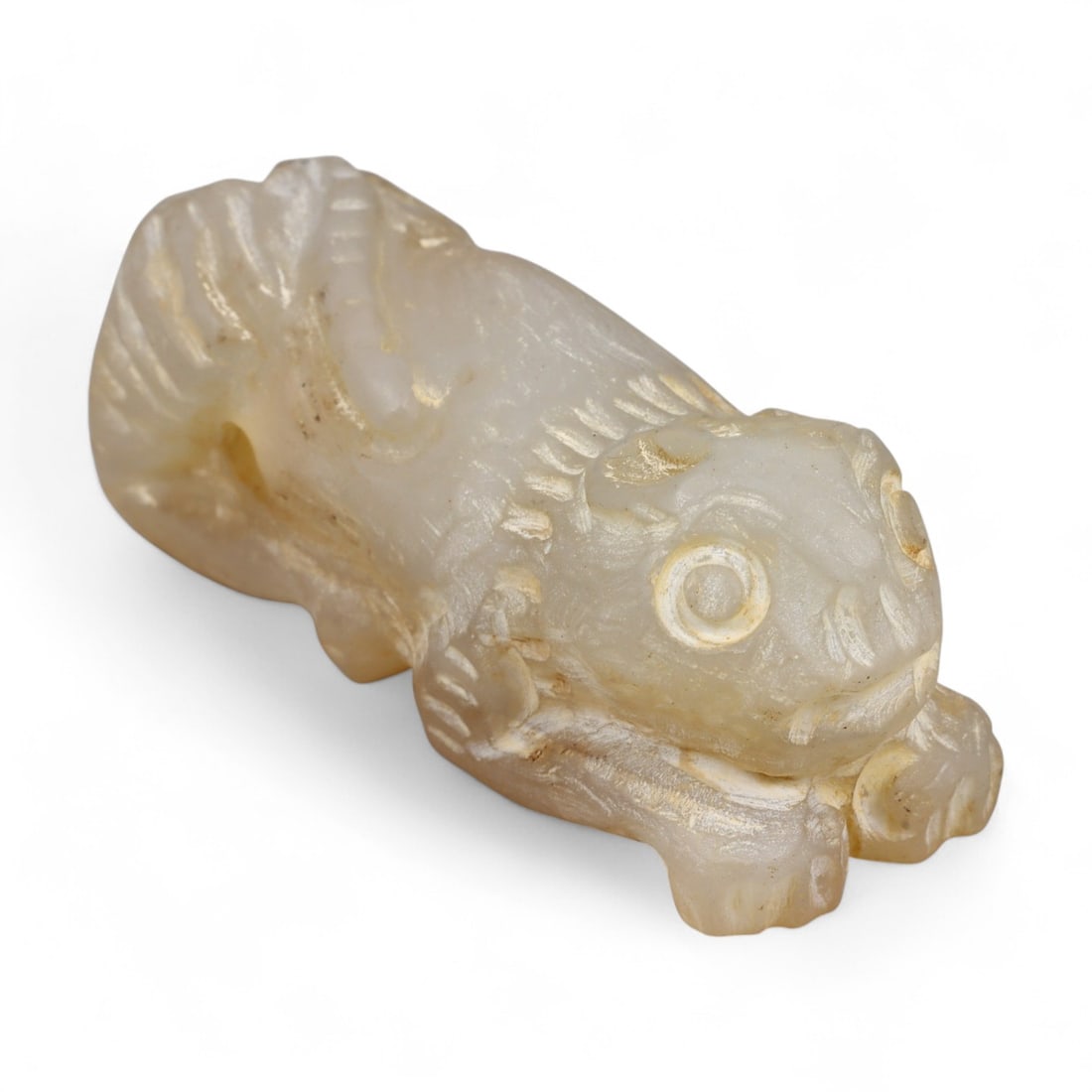 Ancient Bactrian Feline Amulet in Alabaster Stone, c. 2200-1800 BCE, 5 cm: This compact amulet, carved in the form of a crouching feline, originates from the ancient Bactrian region-modern northern Afghanistan and southern Central Asia-during the Bronze Age. Crafted from fin