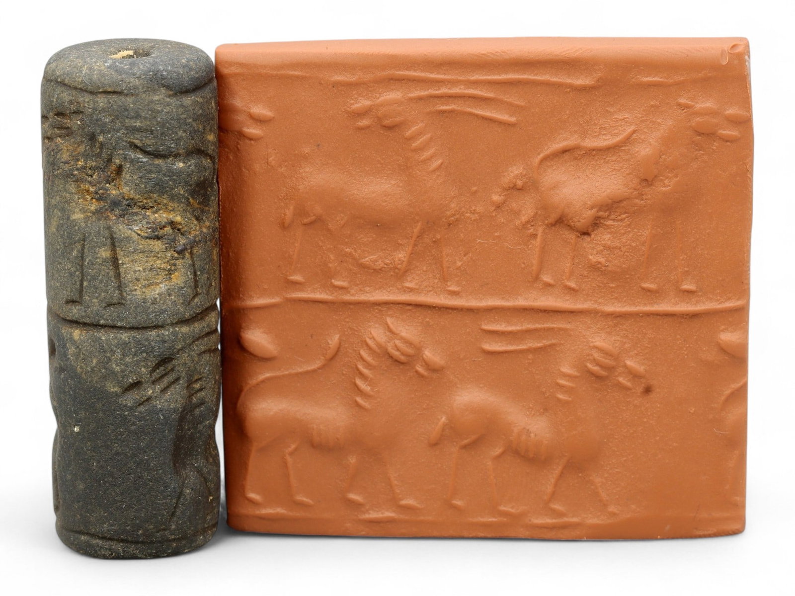 Ancient Mesopotamian Administrative Cylinder Seal, c. 2nd-1st Millennium BCE, 5.5cm: This authentic cylinder seal from ancient Mesopotamia dates to the 2nd to 1st millennium BCE, a time when the art of carving miniature narratives on stone reached remarkable levels of refinement. Seal