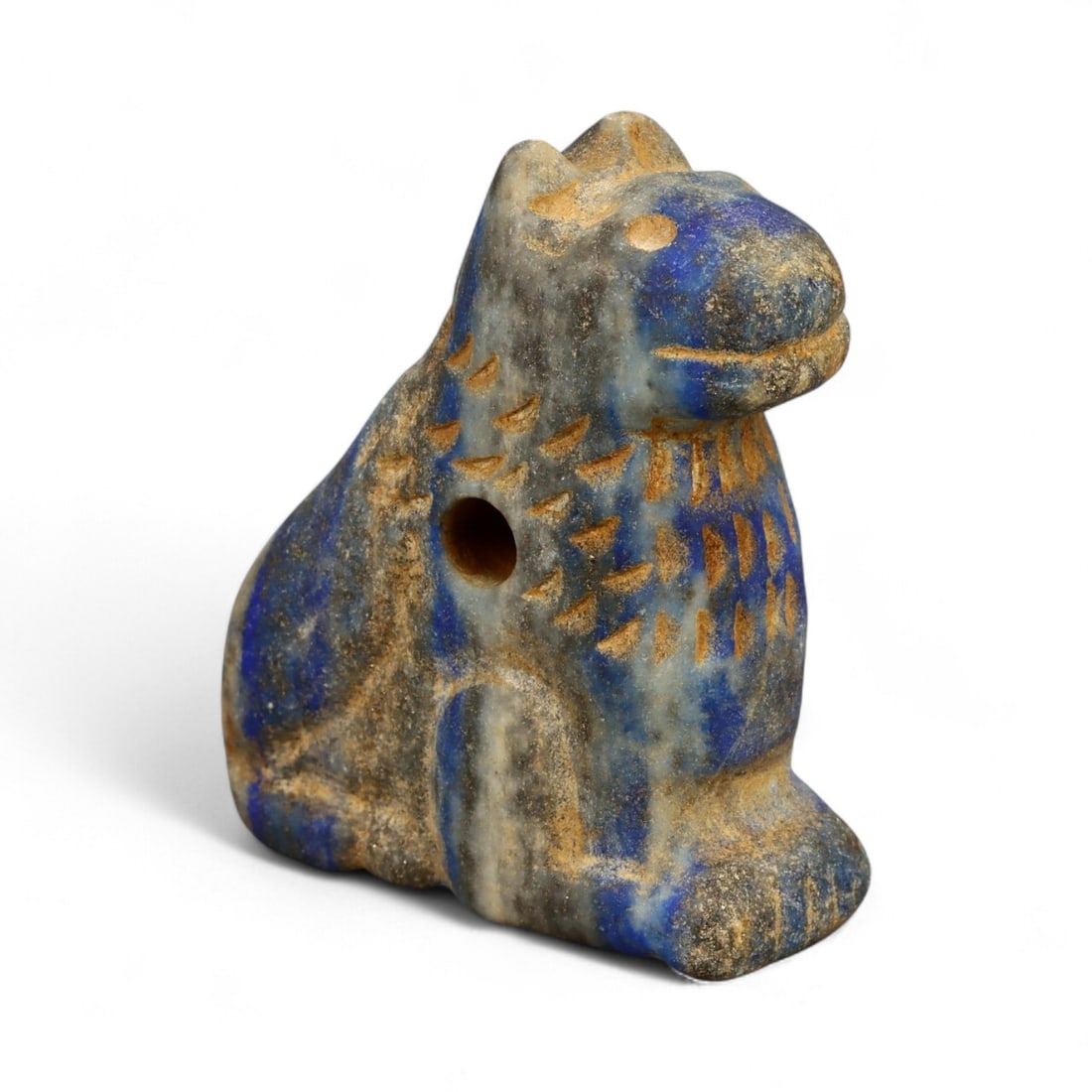 Ancient Bactrian Lapis Lazuli Lion Effigy, c. 2nd-1st Millennium BCE, 5cm: This striking lapis lazuli effigy, carved in the form of a recumbent lion, originates from ancient Bactria, circa 2nd-1st millennium BCE. Sculpted from vibrant blue lapis lazuli streaked with veins of