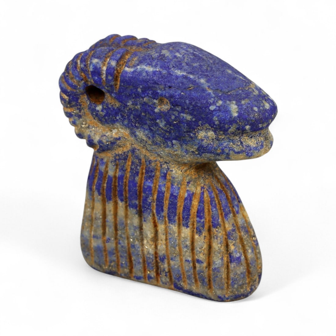 Ancient Bactrian Lapis Lazuli Ram Bust Amulet, c. 2nd-1st Millennium BCE, 4cm: This exquisite lapis lazuli amulet, sculpted in the form of a ram's bust, originates from ancient Bactria-an early civilization that flourished in Central Asia during the 2nd-1st millennium BCE. Bactr