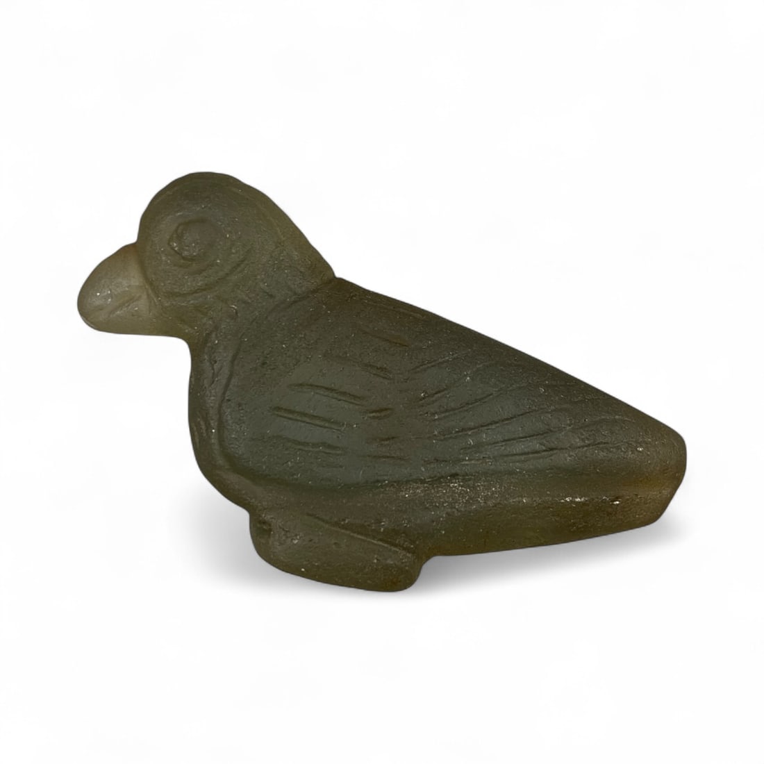 Ancient Parthian Glass Bird Effigy, c. 1st Century BCE-1st Century CE, 6.5cm: This elegant glass bird effigy dates to the Parthian Empire, a flourishing Iranian civilization renowned for its fusion of Hellenistic aesthetics and Near Eastern symbolism. Fashioned from translucent