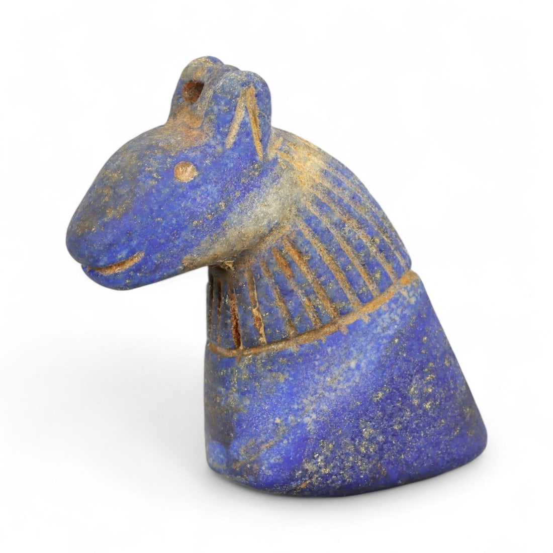 Ancient Bactrian Lapis Lazuli Horse Bust Amulet, c. 2nd-1st Millennium BCE, 5.5cm: This finely sculpted lapis lazuli effigy of a horse's head originates from ancient Bactria, circa 2nd-1st millennium BCE - a civilization that flourished across modern northern Afghanistan and souther