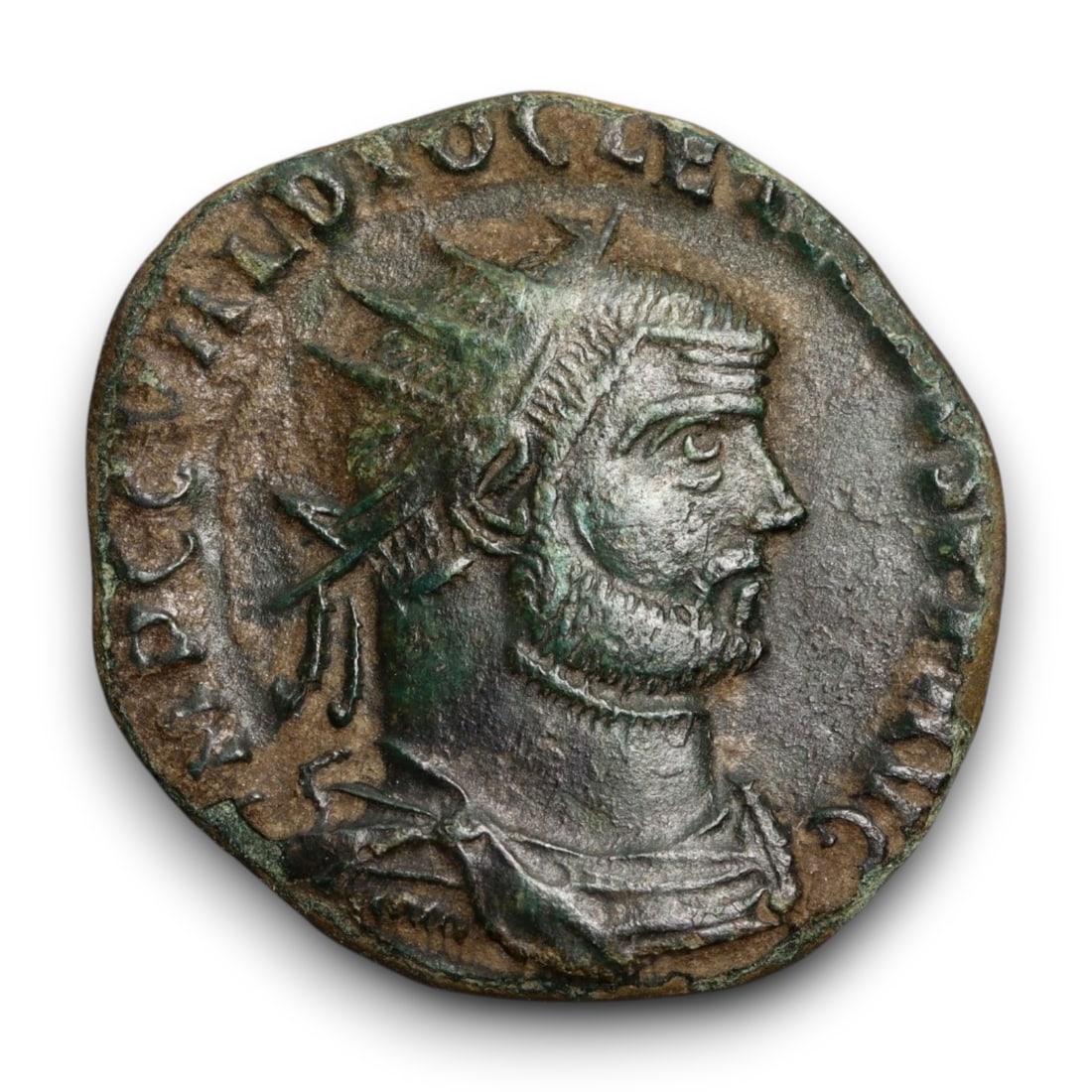 ROMAN EMPIRE: Imperial Authority - Bronze Coin, c. 1st-3rd Century AD, 18mm: Struck during the turbulent decades of the later Roman Empire, this 19mm bronze coin reflects the enduring symbolism of imperial control amidst crisis. Its compact yet deliberate design likely feature