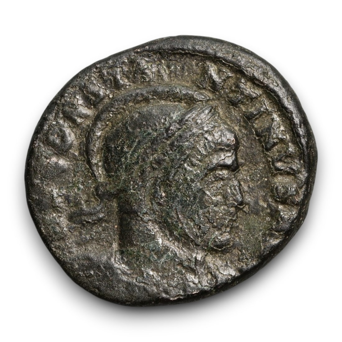 ROMAN EMPIRE: Imperial Authority - Bronze Coin, c. 1st-3rd Century AD, 17mm: Struck during the turbulent decades of the later Roman Empire, this 19mm bronze coin reflects the enduring symbolism of imperial control amidst crisis. Its compact yet deliberate design likely feature
