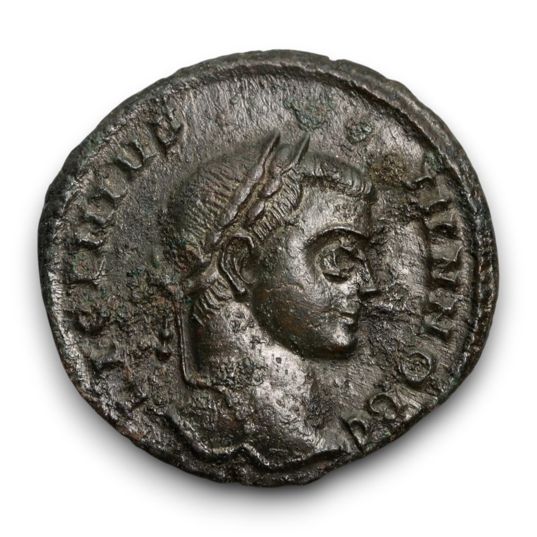 ROMAN EMPIRE: Imperial Authority - Bronze Coin, c. 1st-3rd Century AD, 18mm: Struck during the turbulent decades of the later Roman Empire, this 19mm bronze coin reflects the enduring symbolism of imperial control amidst crisis. Its compact yet deliberate design likely feature