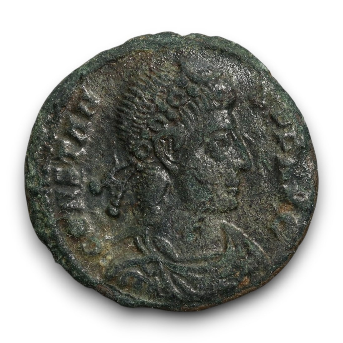 ROMAN EMPIRE: Imperial Authority - Bronze Coin, c. 1st-3rd Century AD, 15mm: Struck during the turbulent decades of the later Roman Empire, this 19mm bronze coin reflects the enduring symbolism of imperial control amidst crisis. Its compact yet deliberate design likely feature