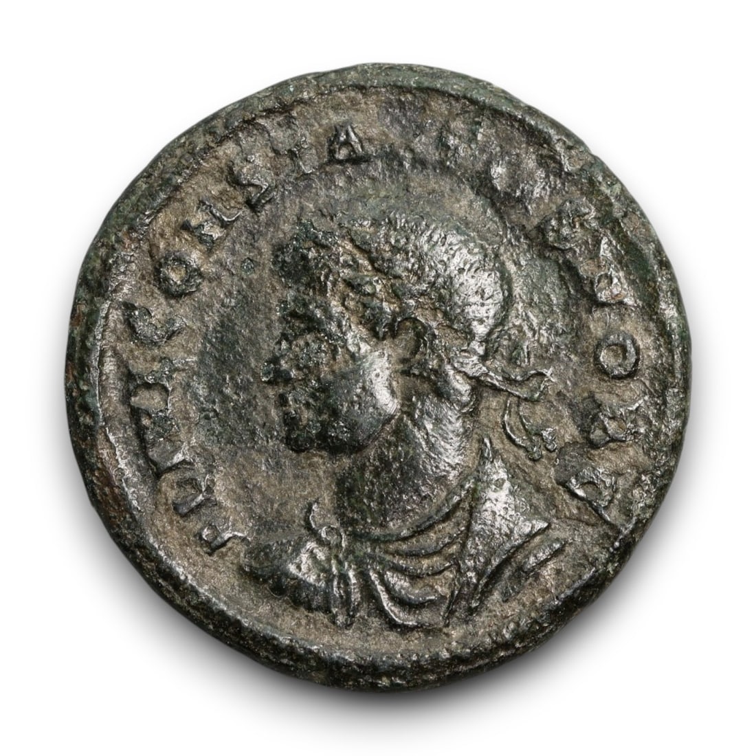 ROMAN EMPIRE: Imperial Authority - Bronze Coin, c. 1st-3rd Century AD, 18mm: Struck during the turbulent decades of the later Roman Empire, this 19mm bronze coin reflects the enduring symbolism of imperial control amidst crisis. Its compact yet deliberate design likely feature