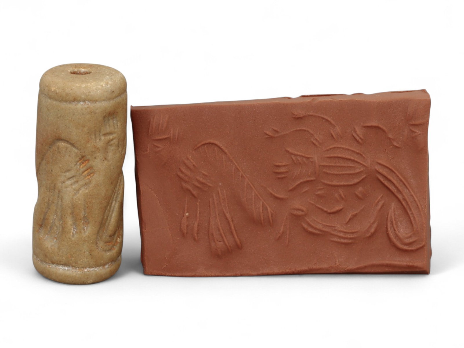 Ancient Mesopotamian Administrative Cylinder Seal, c. 2nd-1st Millennium BCE, 14g: This authentic cylinder seal from ancient Mesopotamia dates to the 2nd to 1st millennium BCE, a time when the art of carving miniature narratives on stone reached remarkable levels of refinement. Seal