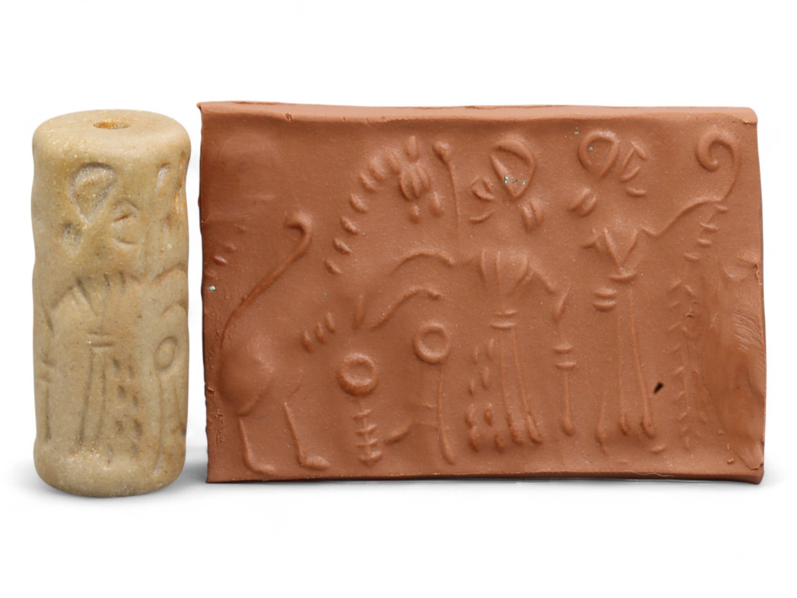 Ancient Mesopotamian Administrative Cylinder Seal, c. 2nd-1st Millennium BCE, 17g: This authentic cylinder seal from ancient Mesopotamia dates to the 2nd to 1st millennium BCE, a time when the art of carving miniature narratives on stone reached remarkable levels of refinement. Seal