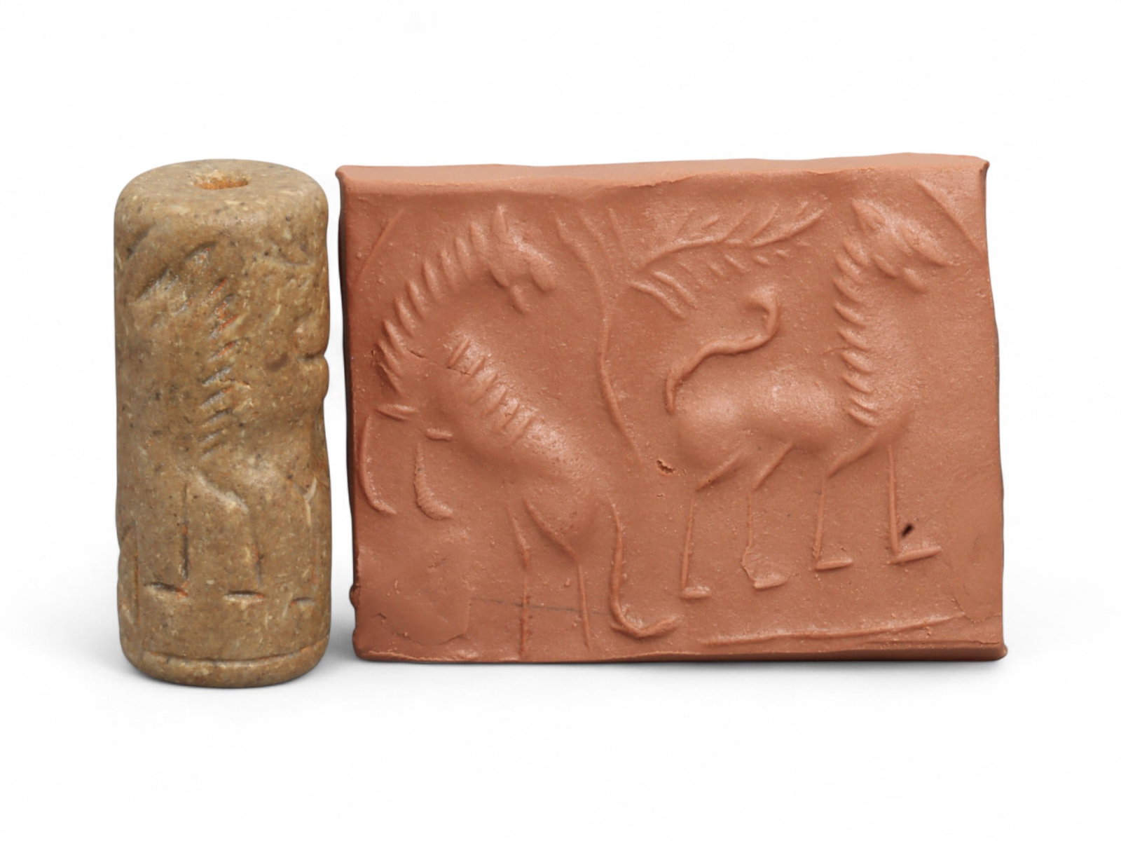 Ancient Mesopotamian Administrative Cylinder Seal, c. 2nd-1st Millennium BCE, 17g: This authentic cylinder seal from ancient Mesopotamia dates to the 2nd to 1st millennium BCE, a time when the art of carving miniature narratives on stone reached remarkable levels of refinement. Seal