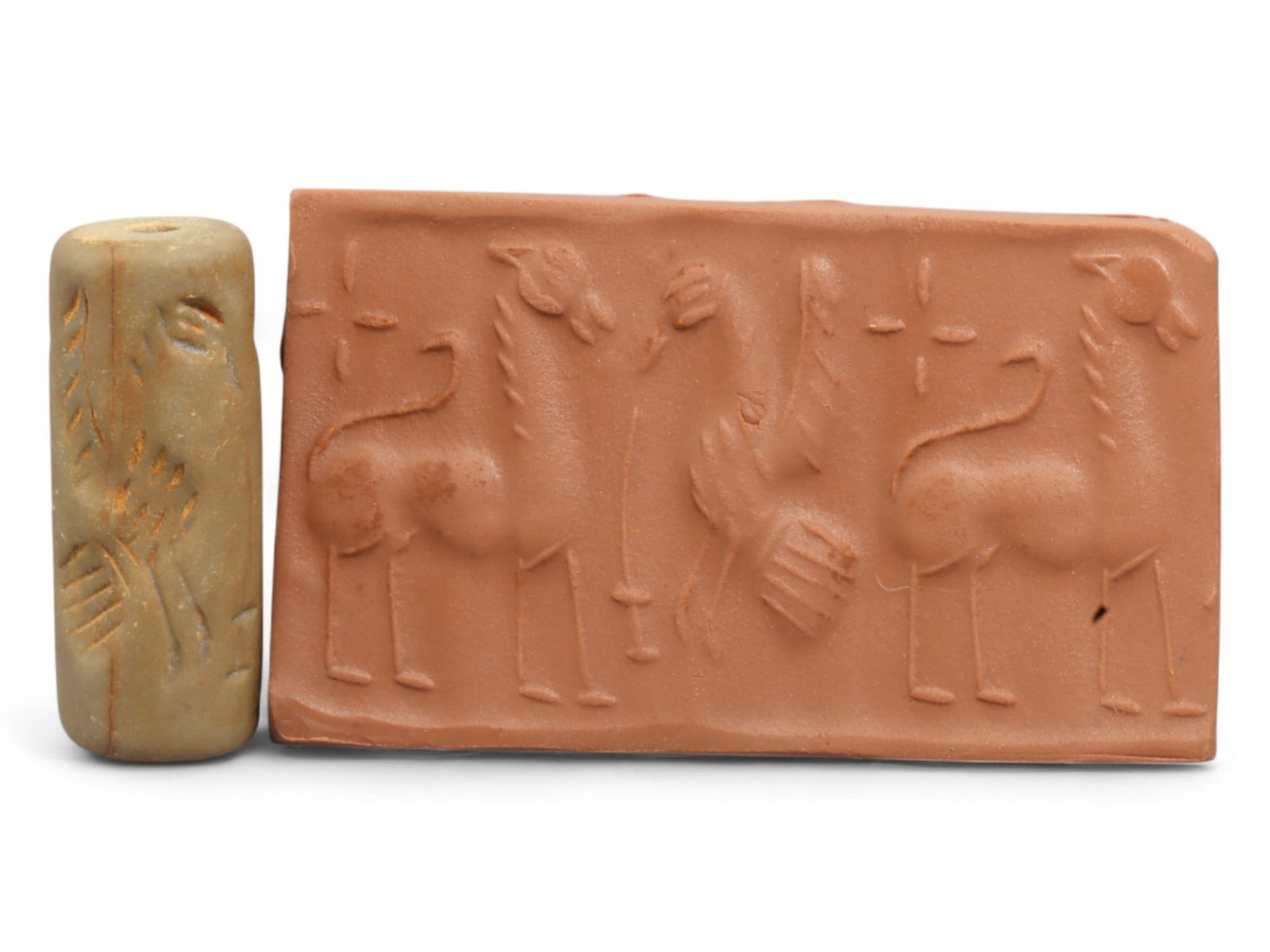 Ancient Mesopotamian Administrative Cylinder Seal, c. 2nd-1st Millennium BCE, 12g: This authentic cylinder seal from ancient Mesopotamia dates to the 2nd to 1st millennium BCE, a time when the art of carving miniature narratives on stone reached remarkable levels of refinement. Seal